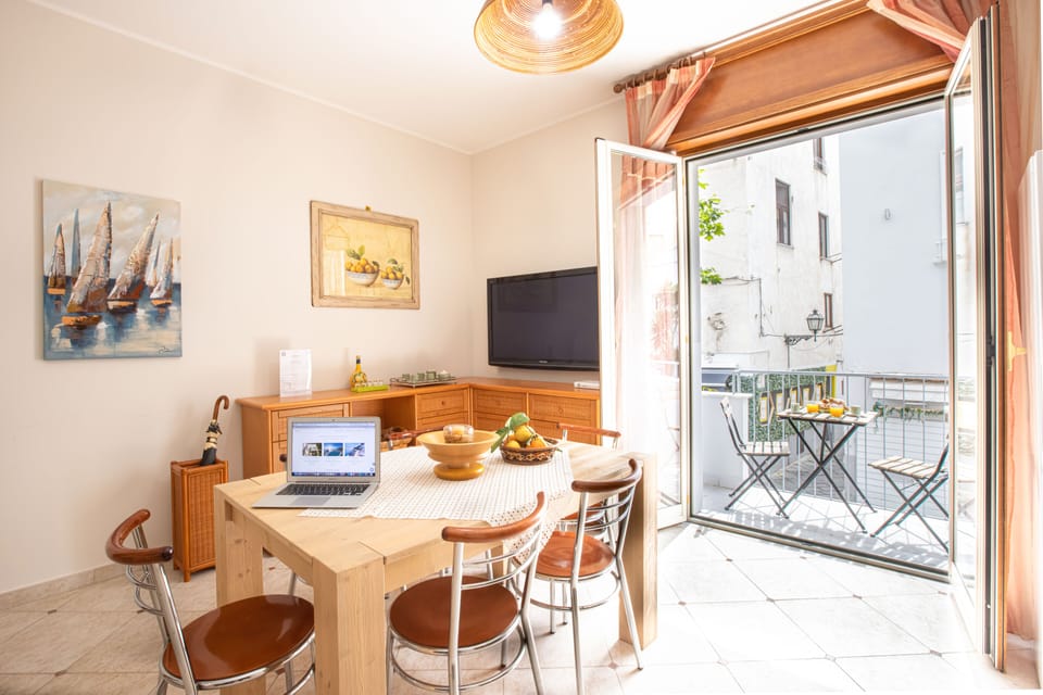 Apartment, 3 Bedrooms | Living area | Flat-screen TV