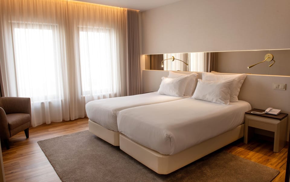 Standard Twin Room, 2 Twin Beds, Non Smoking | Minibar, in-room safe, desk, laptop workspace