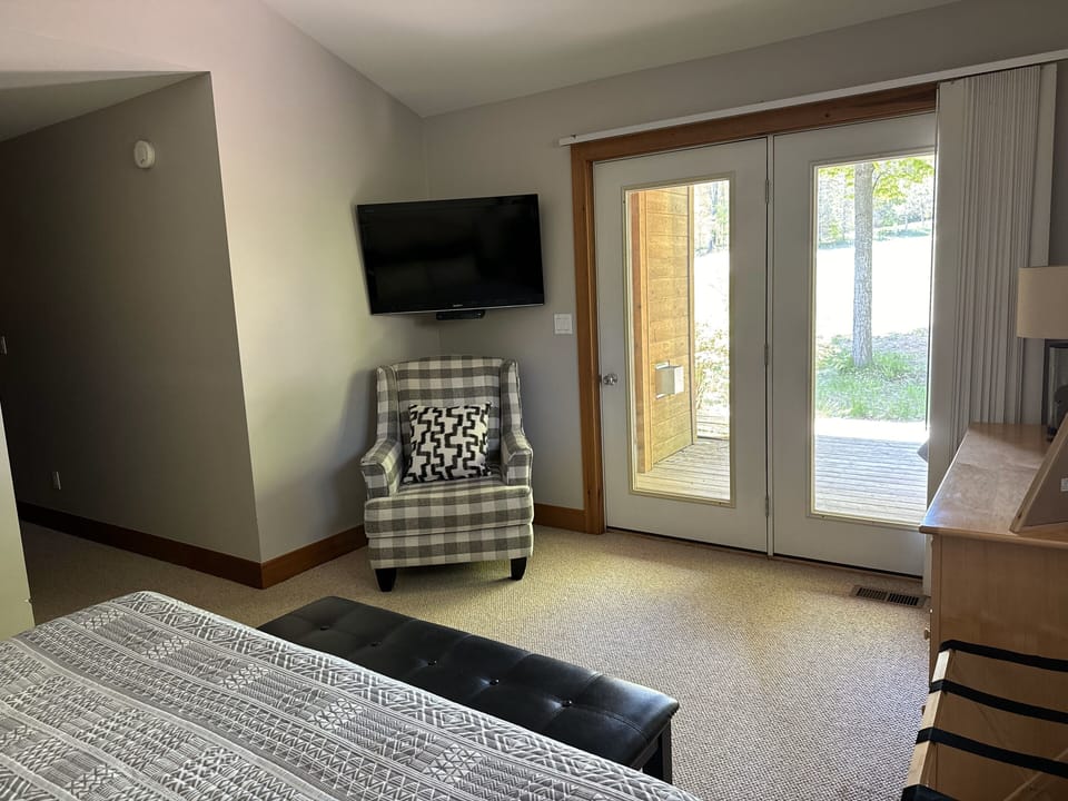 Master bedroom has flatscreen tv