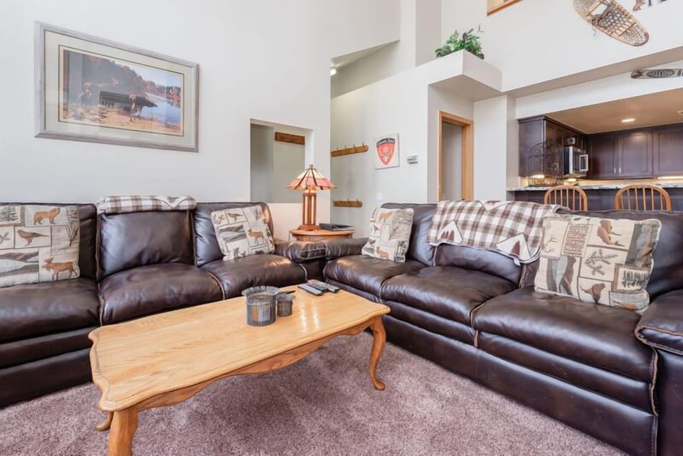 Living Room / TV / Gas Fireplace / Dining Room