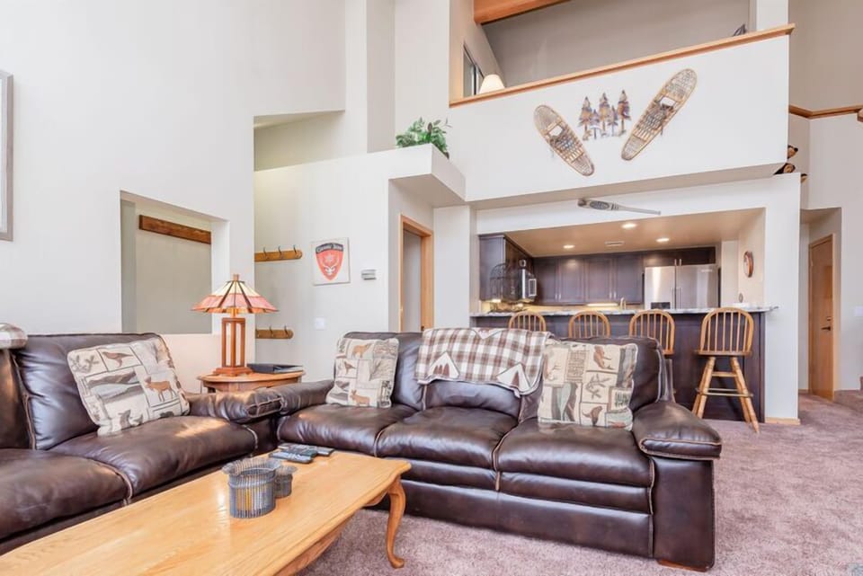 Living Room / TV / Gas Fireplace / Dining Room