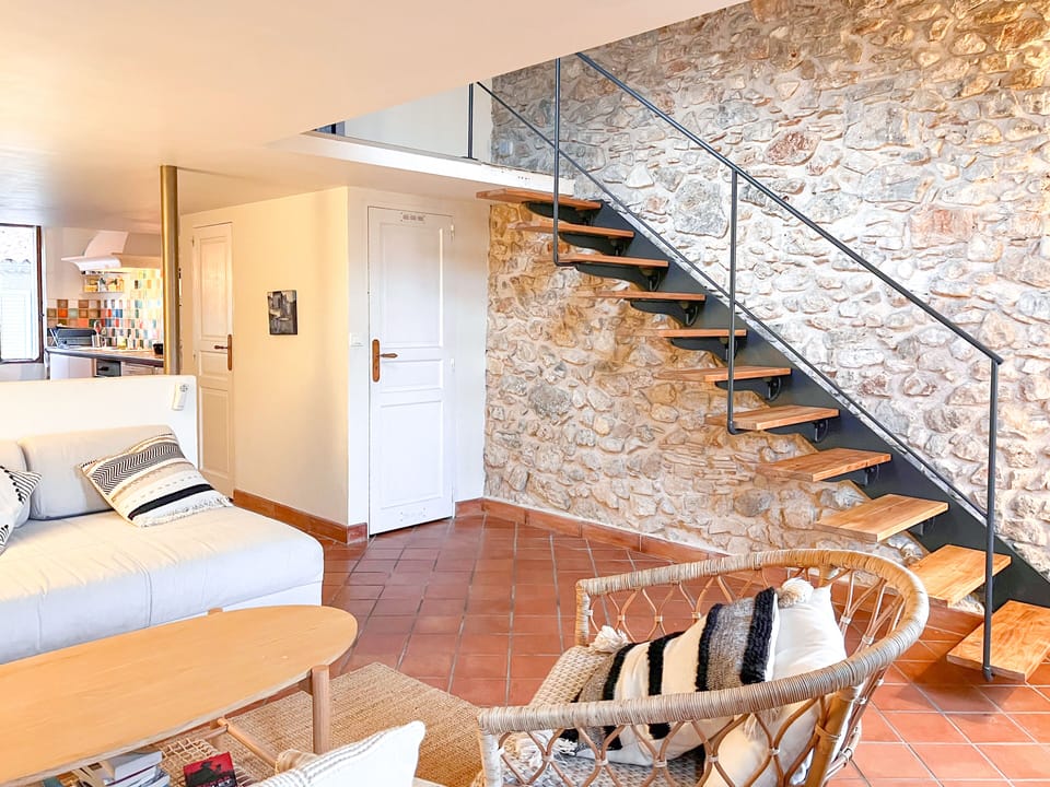 The living room and stairs