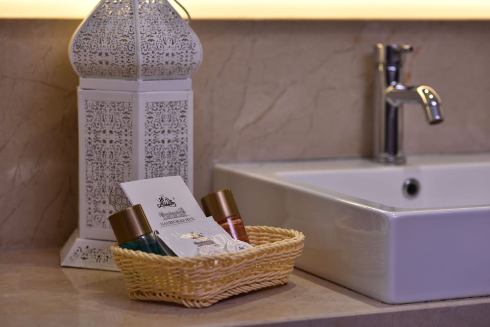 Shower, free toiletries, hair dryer, slippers