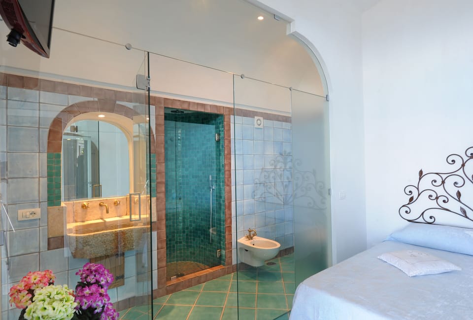 Comfort Double Room, Terrace, Sea View | Minibar, individually decorated, bed sheets