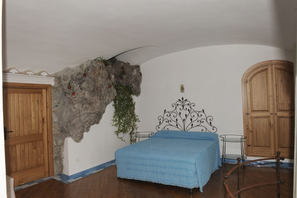 Deluxe Double Room, Terrace, Sea View | Minibar, individually decorated, bed sheets