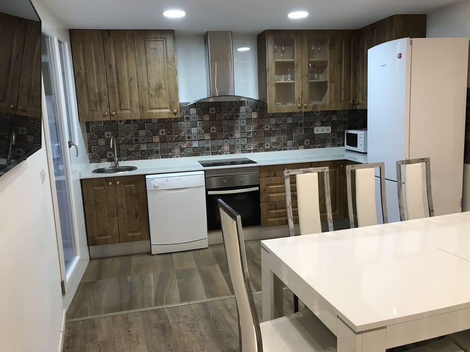 Kitchen and dinning table for 8