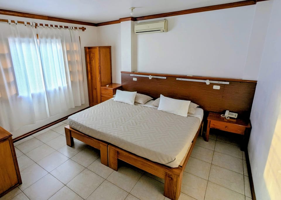 Standard Double Room, 1 King Bed, Private Bathroom | Hypo-allergenic bedding available, desk, laptop workspace, bed sheets