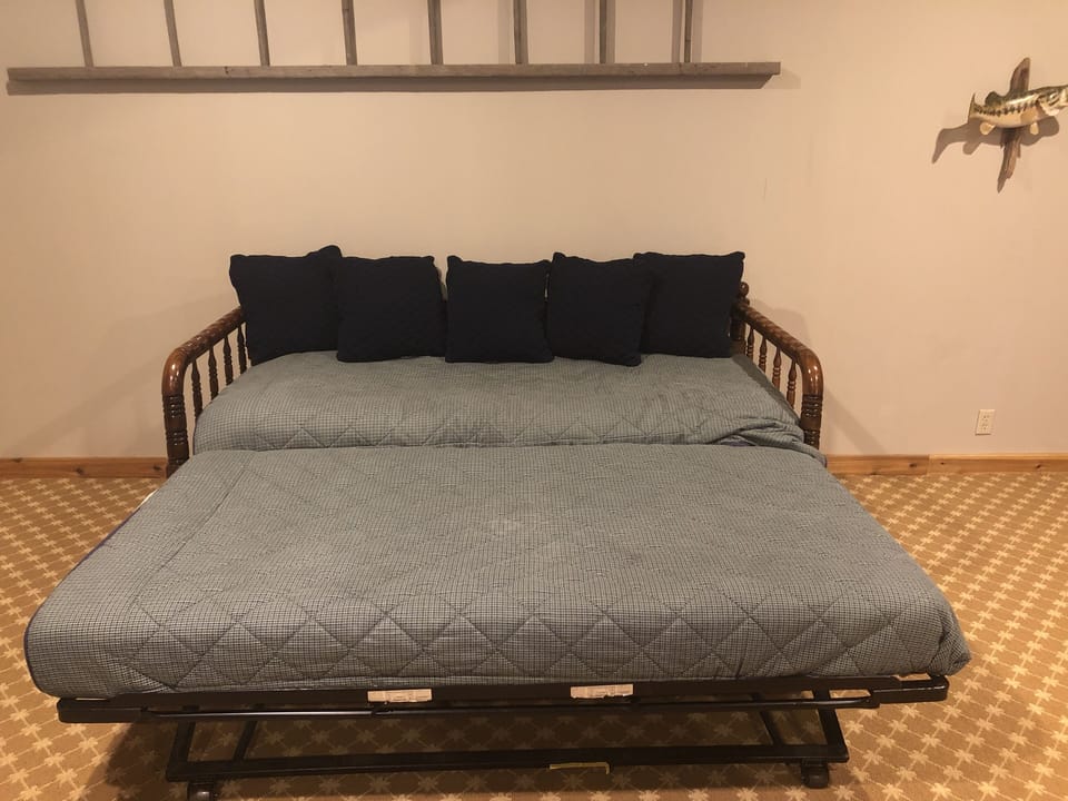The bed in the lower level opens up into a trundle bed