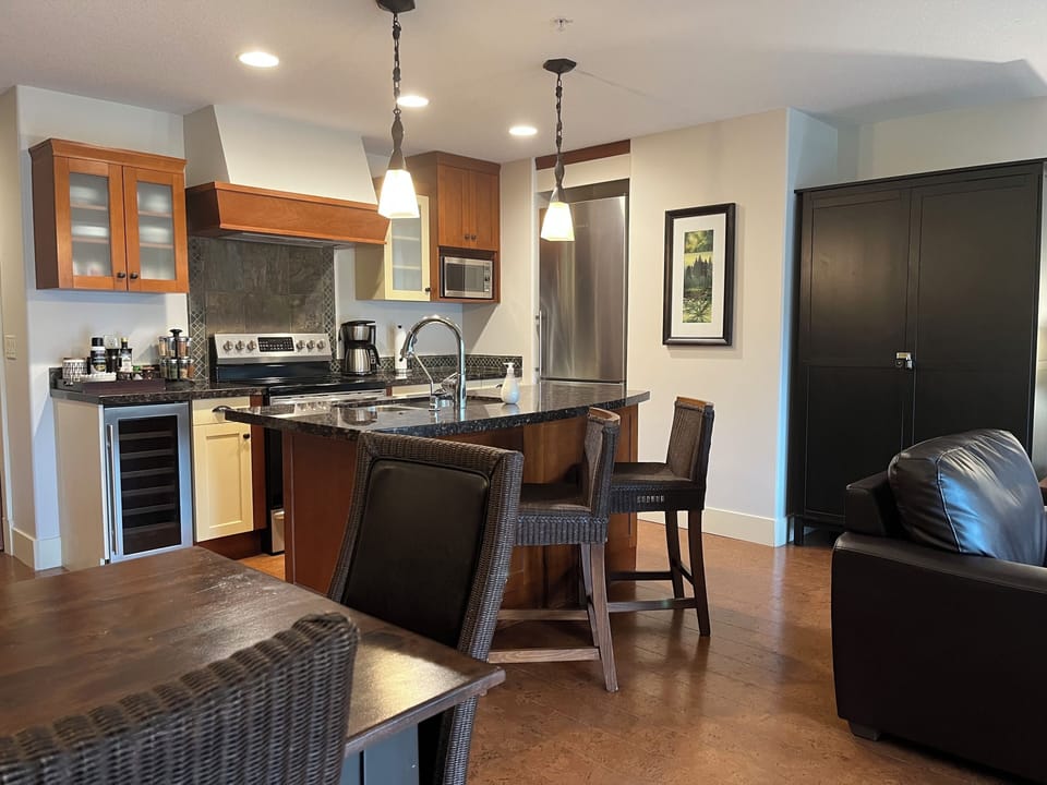 Fully Stocked Kitchen w/Stnls Steel Appliances including Wine Fridge.