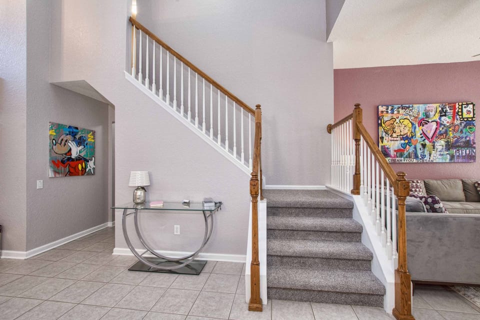 Stairway leads to the two themed kids rooms.