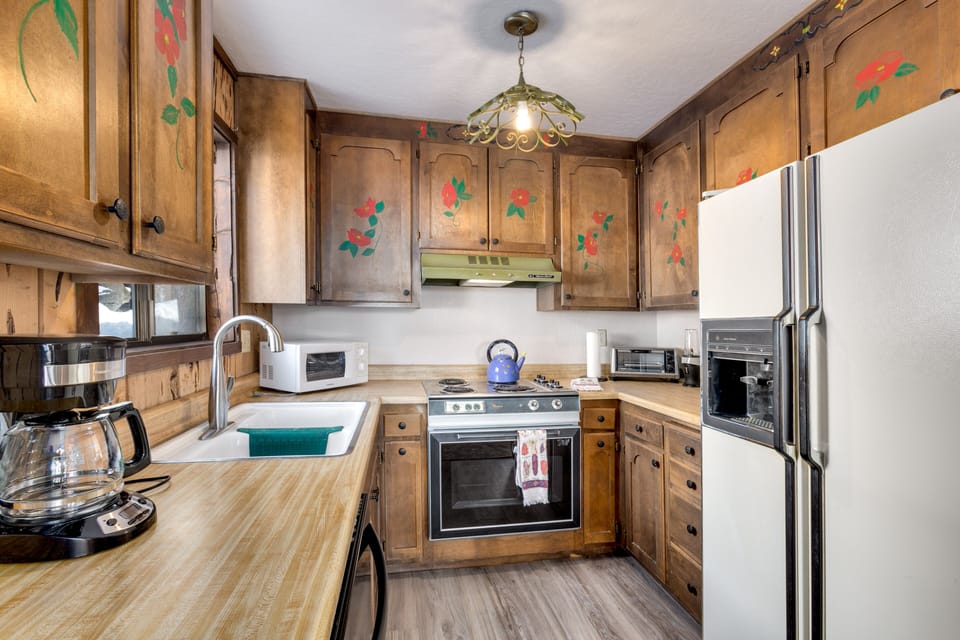 A fully equipped kitchen with everything needed for home-cooked meals.