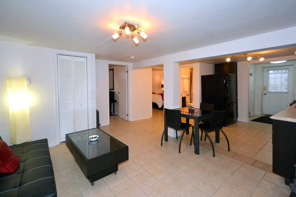 open concept living dining kitchen area