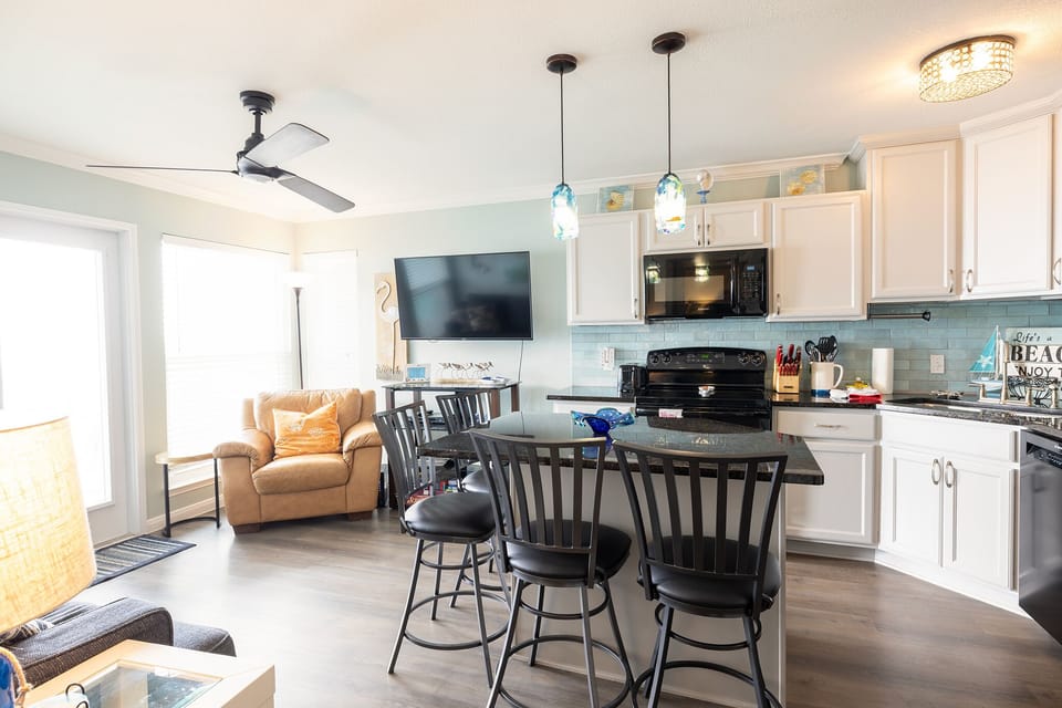 Island is great for meal prep. We have 2 additional stools and 2 tv trays also.