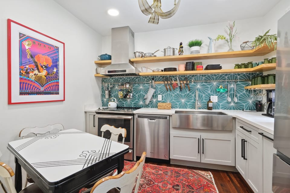 Kitchen, well stocked with everything you need to prepare a meal during your stay: Ninja blender and coffee maker (with coffee and sugar), stainless steel cookware, dutch oven, kettle, basics