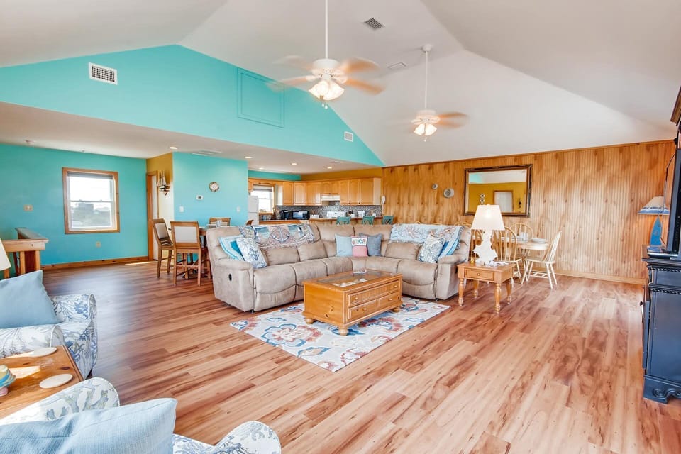 The warm, open layout of the top floor keeps the whole group connected, no matter the activity.
