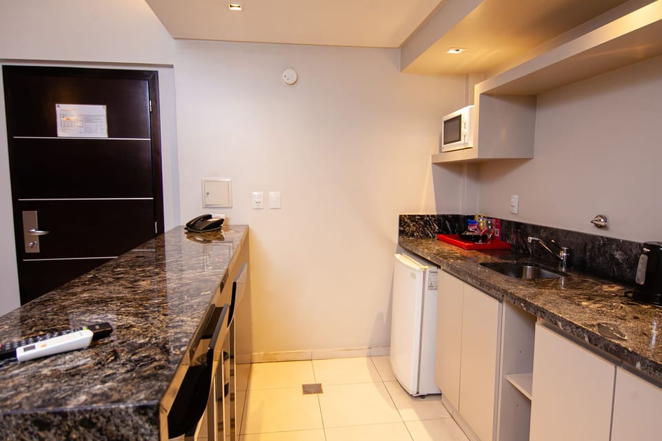 Executive Suite | Premium bedding, down comforters, minibar, in-room safe