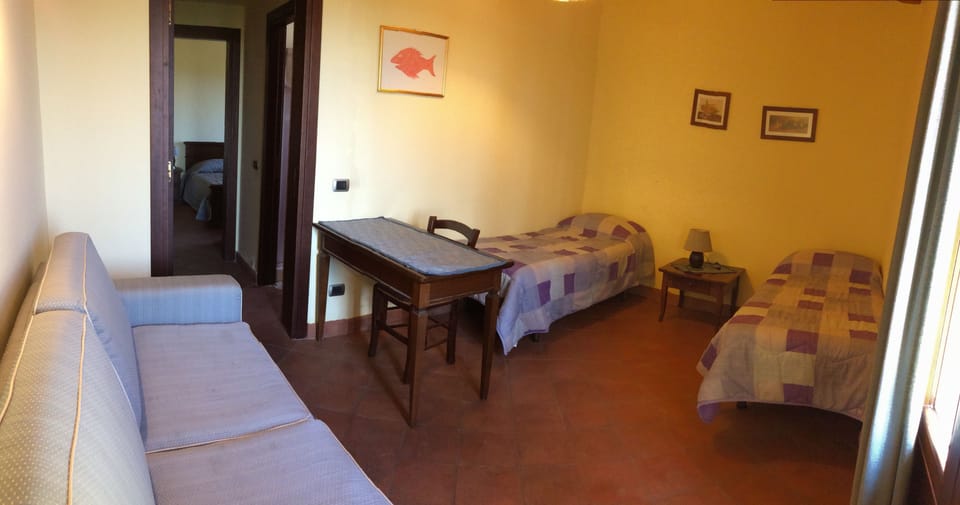Desk, blackout drapes, rollaway beds, free WiFi