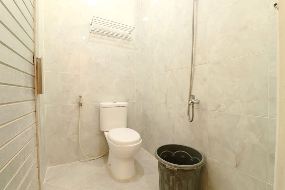 Standard Room | Bathroom | Shower, towels