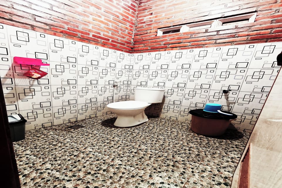 Twin Room, Ocean View | Bathroom | Shower, towels