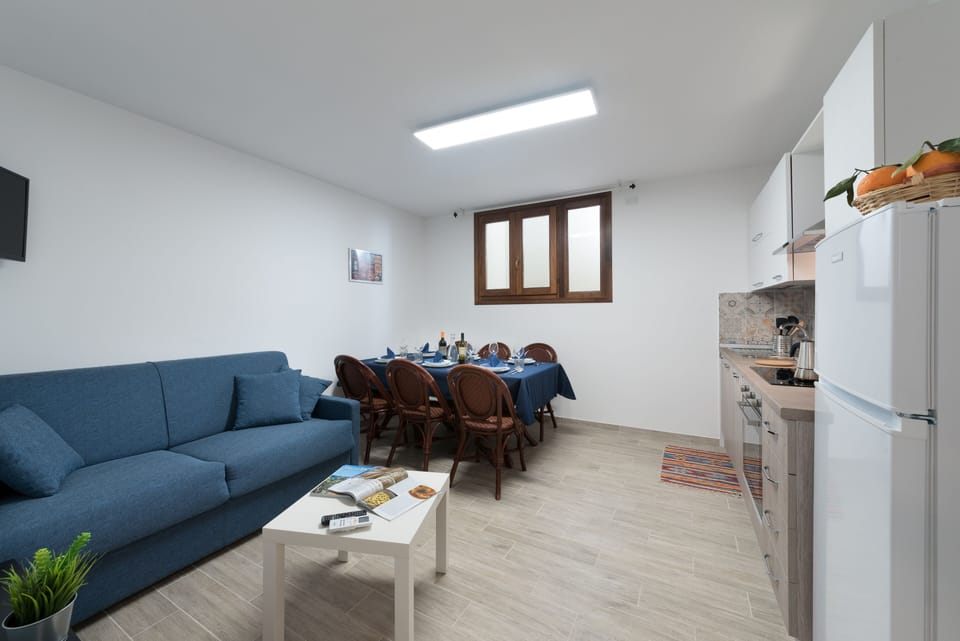 Apartment, 2 Bedrooms | Living area | LCD TV