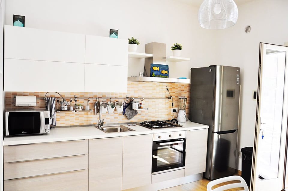 Apartment, 2 Bedrooms | Private kitchen | Fridge, oven, stovetop, espresso maker
