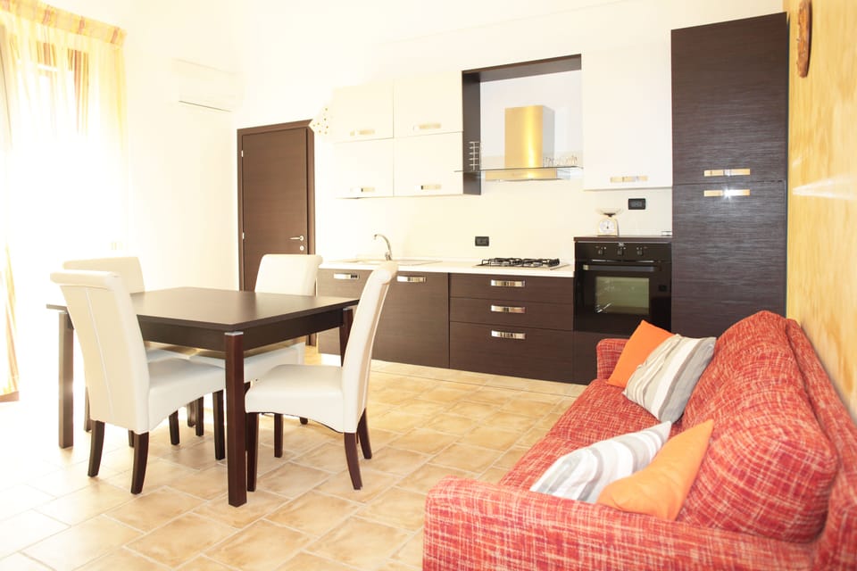 Apartment, 1 Bedroom | Living area | LCD TV