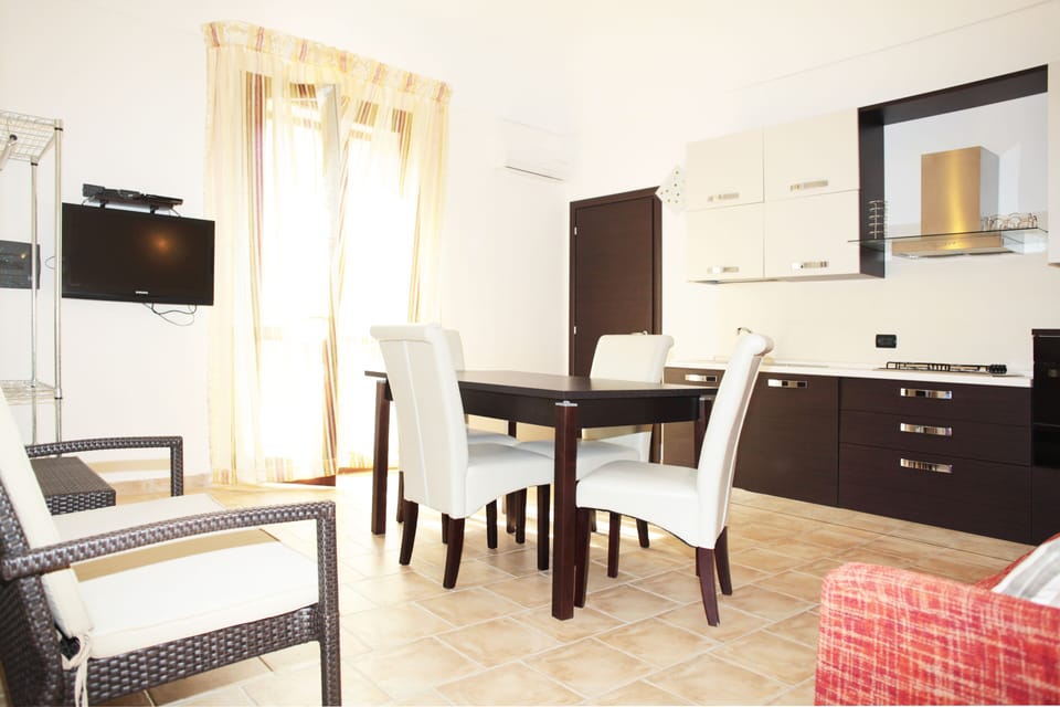 Apartment, 1 Bedroom | Living area | LCD TV