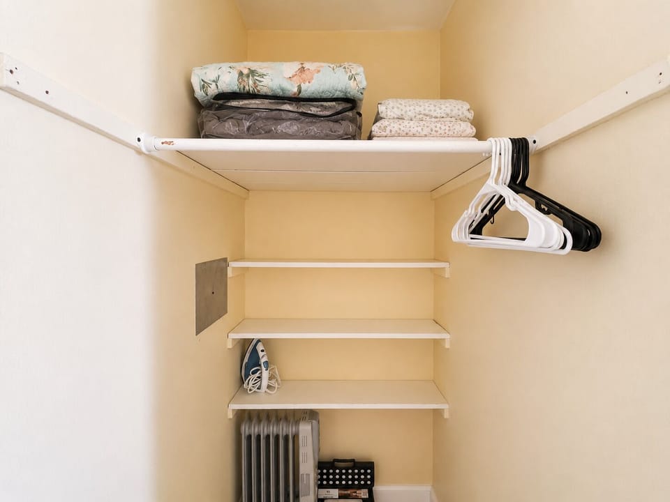 Closet is between the living room and the bathroom