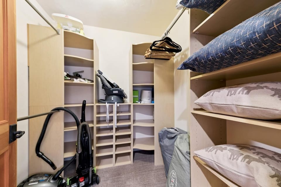 Upstairs king bedroom walk in closet.