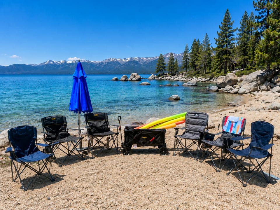 4 adult beach chairs
2 kid/teen chairs
6 pool noodles of varying sizes for the lake
Beach umbrella (screws into the sand)
Large beach blanket
Fold up cart to carry the chairs (with all terrain size tires)