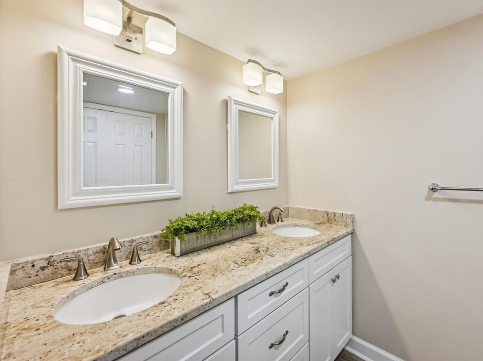 Renovated Master Bathroom with Double Vanity at 2316 Villamare