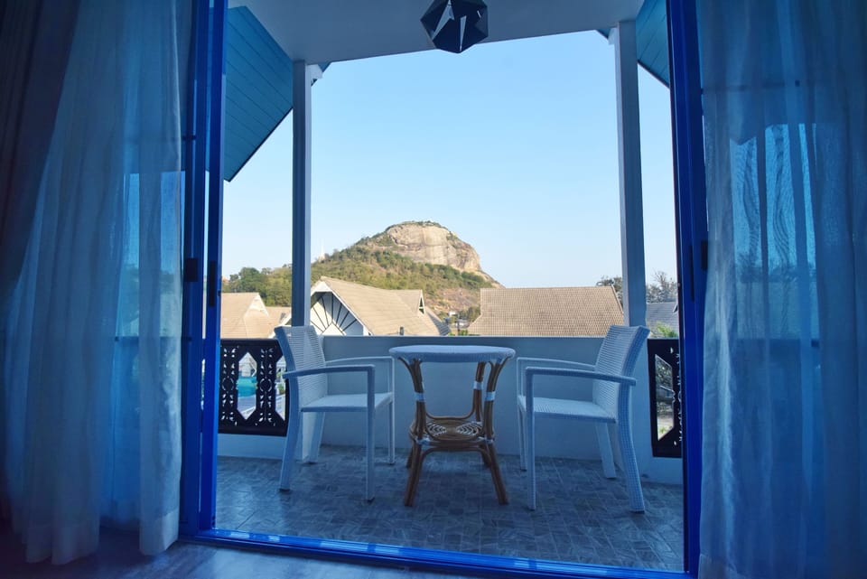 small balcony at 3rd floor bedroom with view of Khao Takiab mountain.
