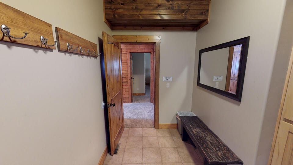 A mudroom is located within the cabin to store shoes and coats.