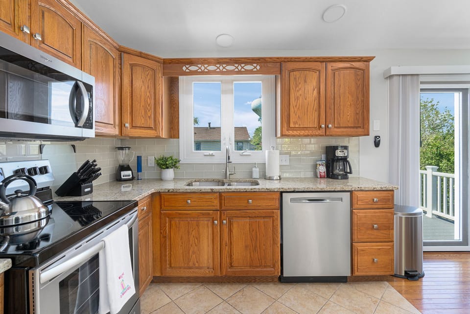 Kitchen leading out to Elevated Deck