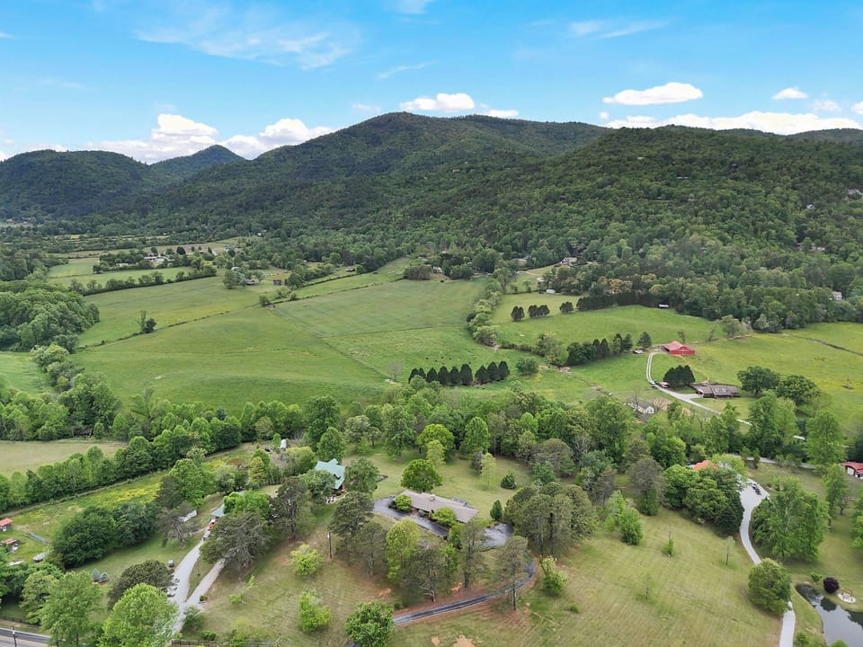 Wolffork Valley — farmland, pastures, Little Tennessee, Blue Ridge beyond.