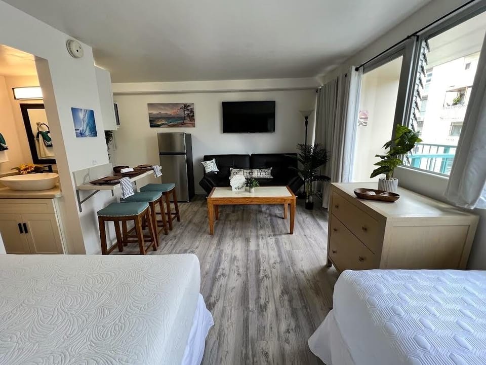 Queen bed, a twin bed & a sofa that converts to a double size bed