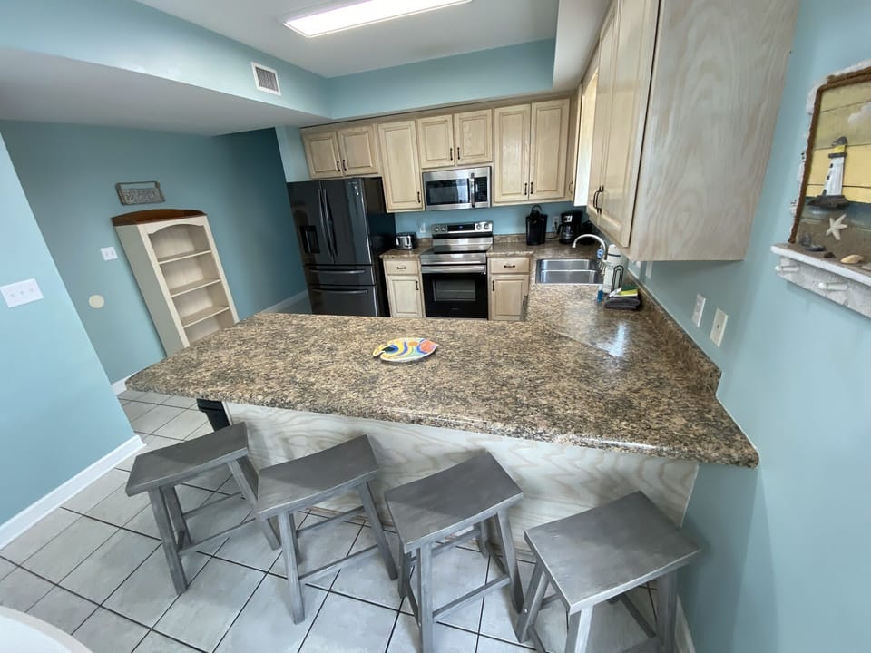 View of bar overlooking kitchen (1st floor ocean view)