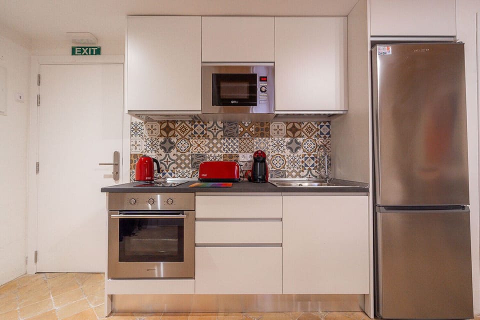 Vintage Palma Palace - This holiday apartment in the middle of Palma de Majorca has an equipped kitchen with oven and microwave, toaster, coffee machine and kettle.