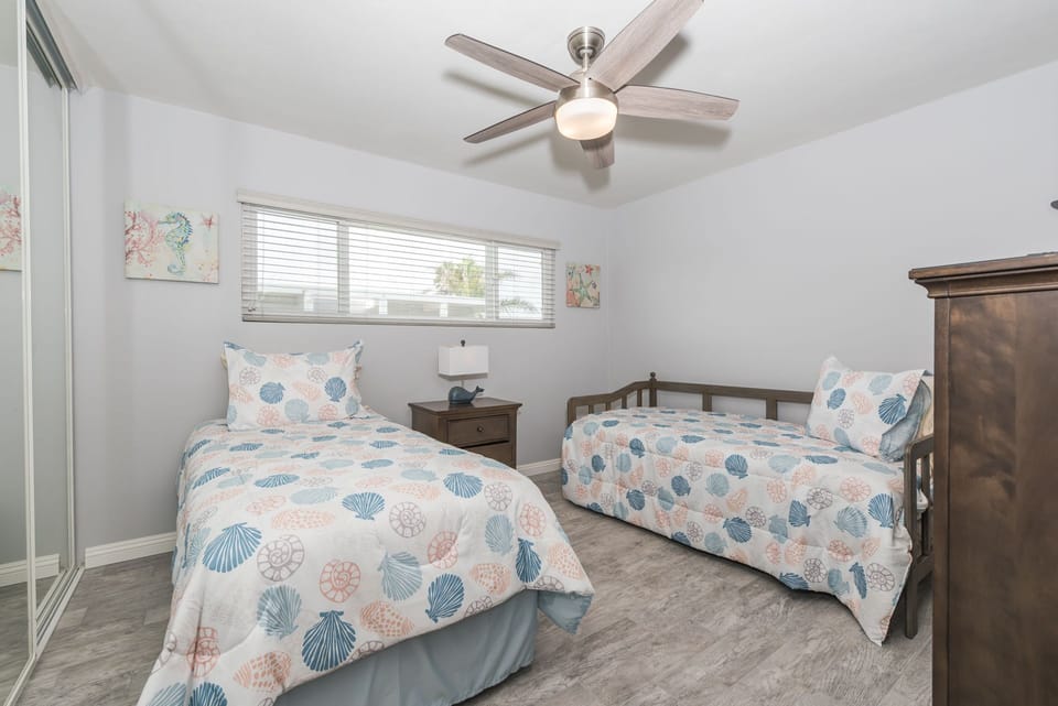 The third bedroom includes 2 twin beds and an additional twin trundle bed as well as Roku TV.
                