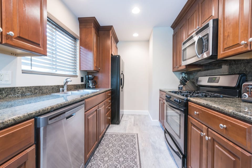 The main kitchen comes stocked with dishes, utensils, cookware, bakeware and all major and small appliances.
                