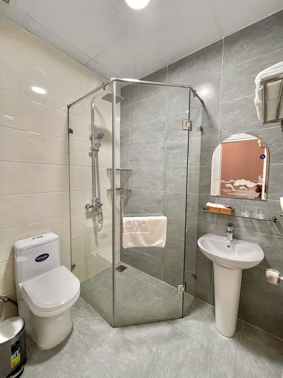 Shower, free toiletries, hair dryer, slippers