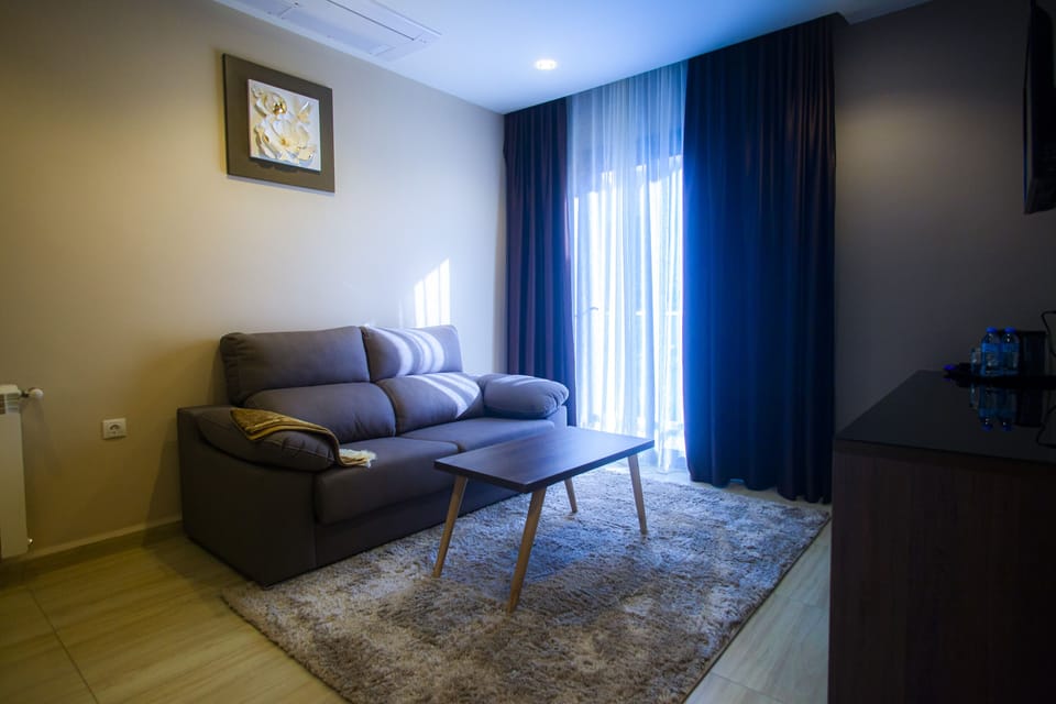 40-inch flat-screen TV with satellite channels, TV