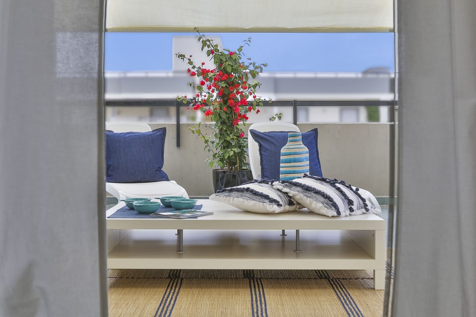 Ample floor-to-ceiling windows and glass doors offer plenty of natural light 