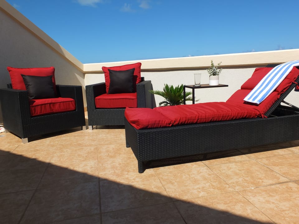 Plenty of space on the veranda to sun, lounge or read a book.