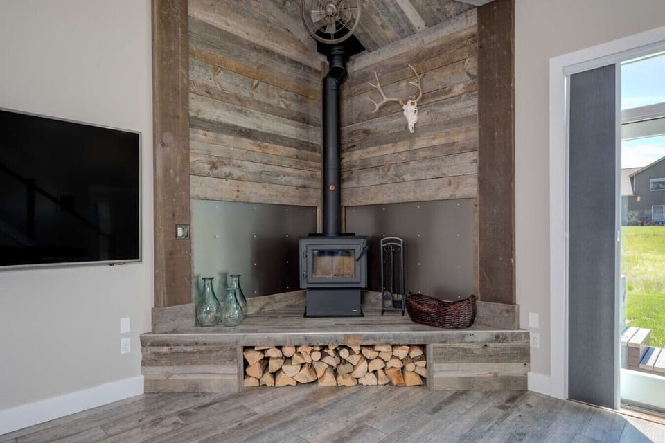 Fully stocked fireplace: wood, newspaper, matches, kindling