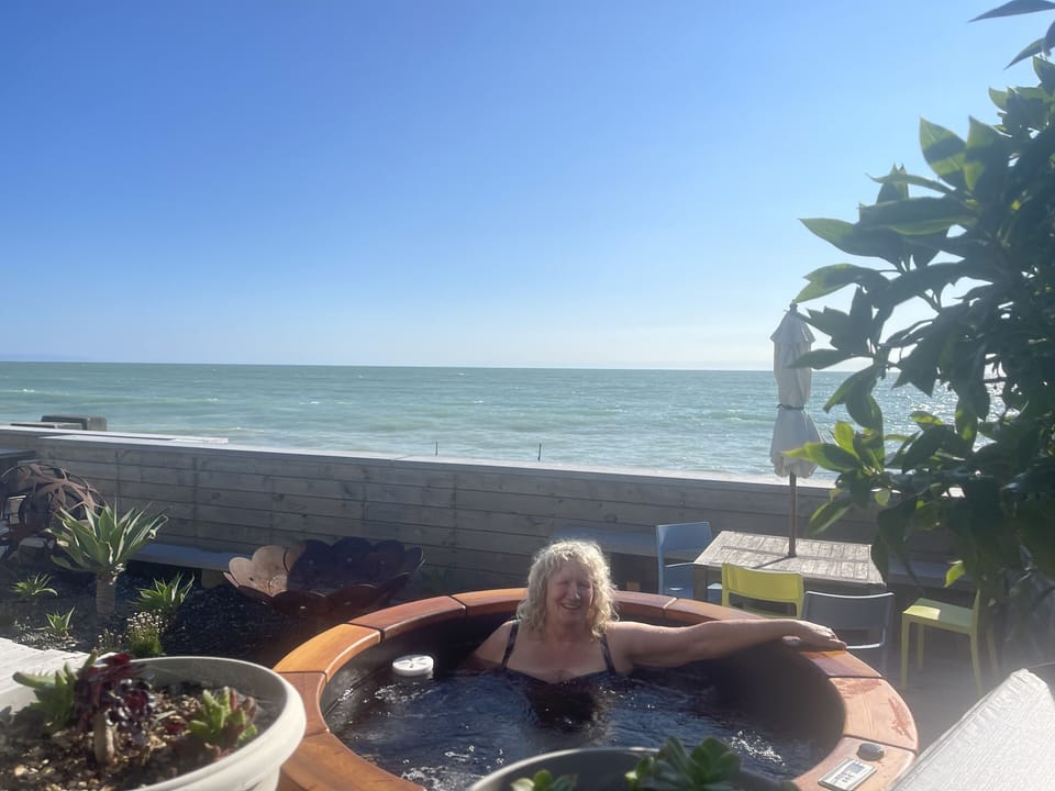 Happy Guest supplied photo of her cedar hot tub soak