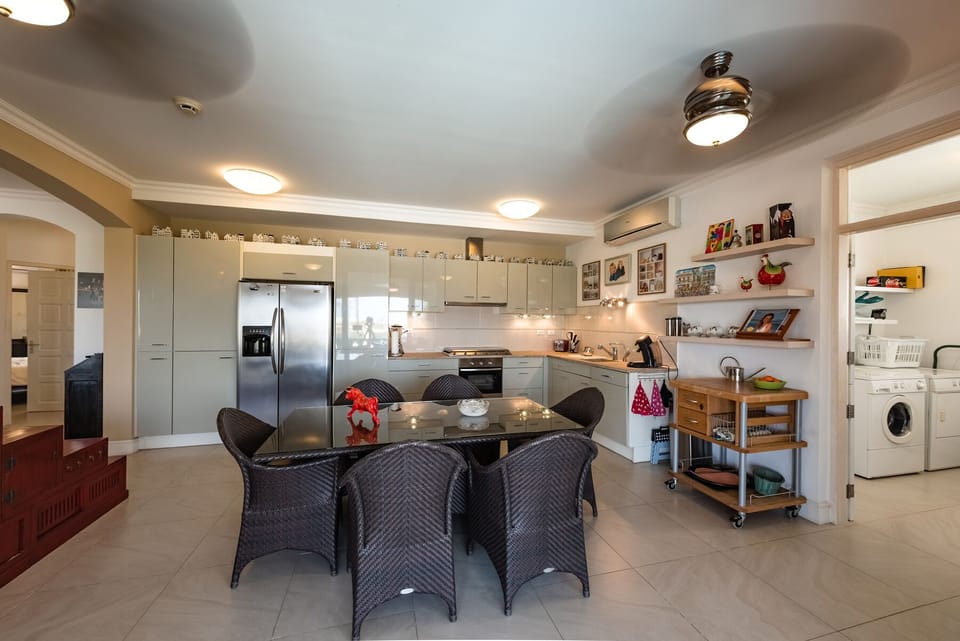 fully equipped kitchen and indoor dining. 