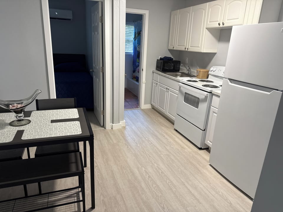 Apartment, 2 Bedrooms | Private kitchen | Microwave, coffee/tea maker, toaster