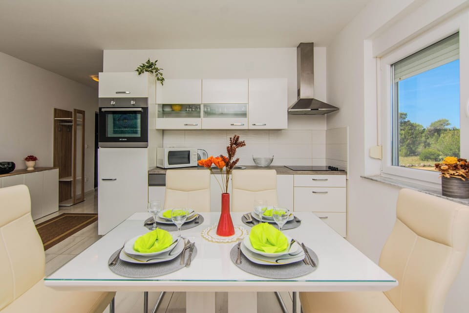 Apartment, Sea View A1 | Private kitchen | Fridge, microwave, oven, stovetop