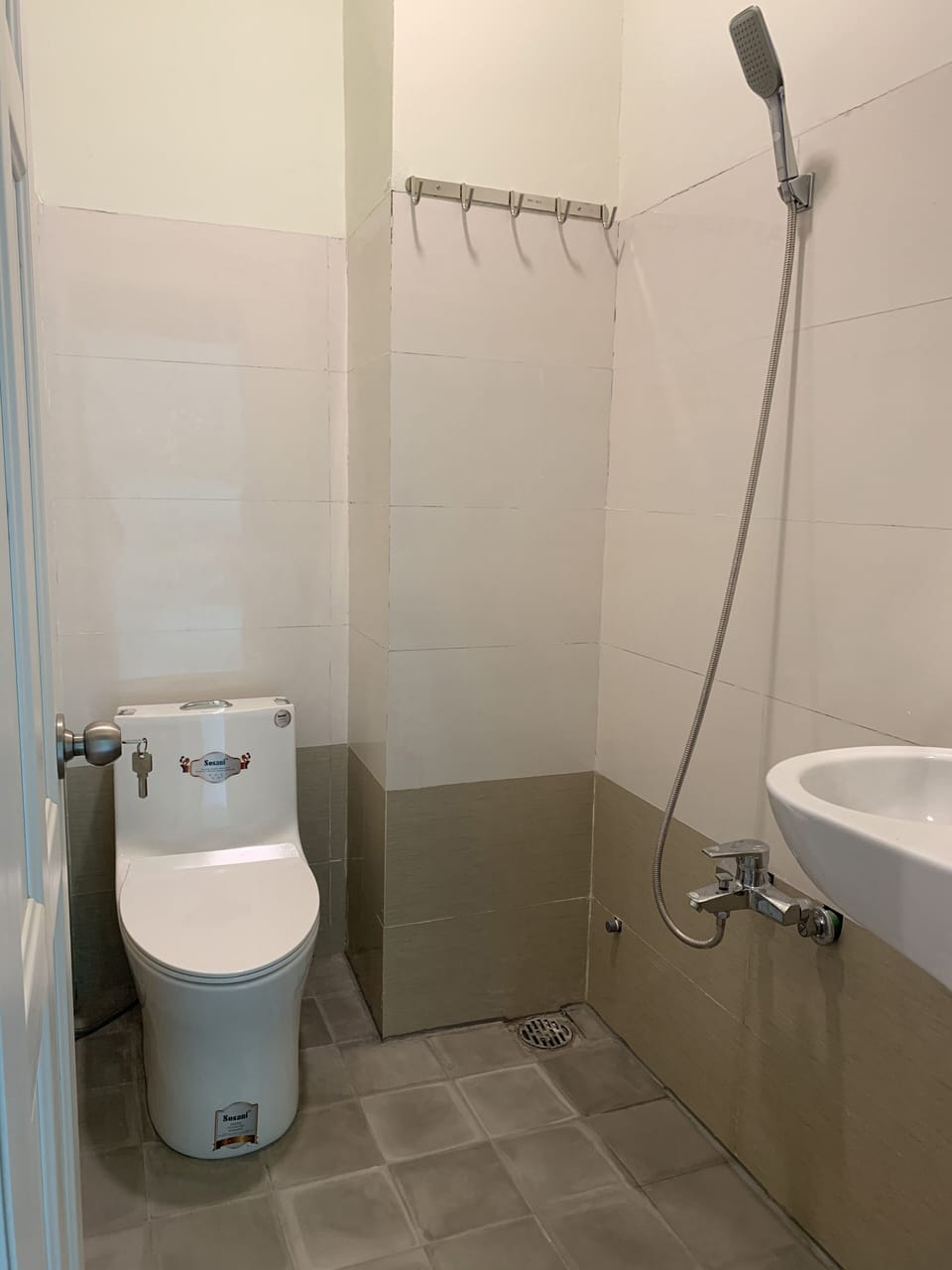 Shower, free toiletries, hair dryer, slippers